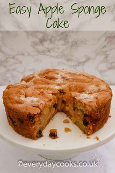 an easy apple sponge cake on a white plate with the words, easy apple sponge cake