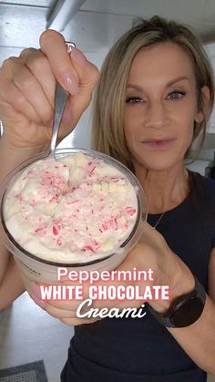 a woman is holding a bowl of white chocolate and peppermint icecream