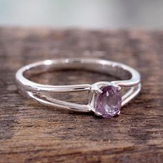 A solitary lilac oval sparkles with elegance. Crowning a slender silver ring from Bhavesh the amethyst is exquisite. .925 Sterling silver Delicate Amethyst Ring, Silver Ring For Women Unique, Light Amethyst Ring, Simple Ring Silver, Silver Ring Designs For Women, Silver Amethyst Ring, Silver Rings For Women Stones, Simple Ring Designs Silver, Silver Ring Designs For Girl