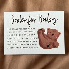 a card with an image of a bear on it's back and the words boos for baby written in black ink