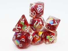 a group of red and white dice sitting on top of each other