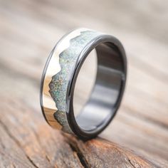 a wedding ring that has been made to look like a mountain