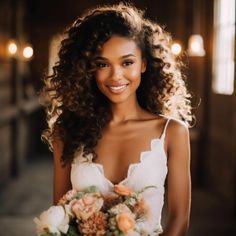 a beautiful young woman holding a bouquet of flowers