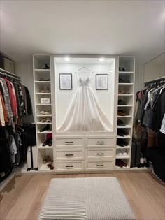 a closet with clothes and shoes in it