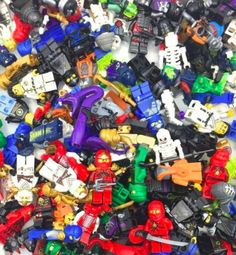 there are many legos all together in this pile and one is red, the other blue