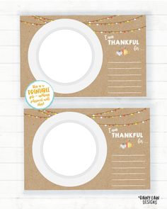 two thanksgiving place cards with white plates on them