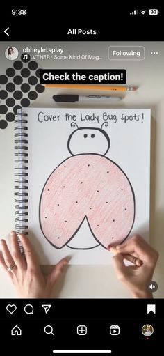 someone is holding up a lady bug coloring book to show it's name on the page