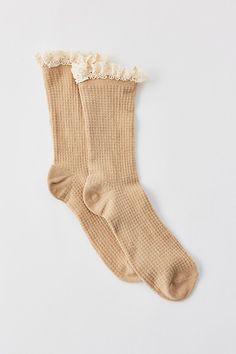 Ultra-soft and lightweight waffle knit socks in a crew length with a sweet ruffle trim along the ankle. Features Lace-trim waffle knit socks Soft waffle knit socks Femme ruffle at the ankle Crew sock length Content + Care 98% Polyester, 2% spandex Machine wash Imported | Lace-Trim Waffle Knit Sock in Taupe, Women's at Urban Outfitters Lace Socks, Crew Sock, Knit Socks, Waffle Knit, Costume Ideas, Ruffle Trim, Knitting Socks, Crew Socks, Color Coding