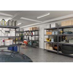 a garage filled with lots of shelves and tools