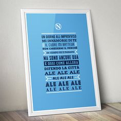 a blue poster with some type of words in it on a wooden floor next to a white wall