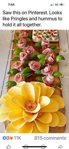 flowers are arranged in rows on a table with text that reads, saw this on pinterest looks like pringles and hummus to hold it all together