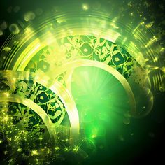 an abstract green background with gold and black swirls, stars and sparkles in the center