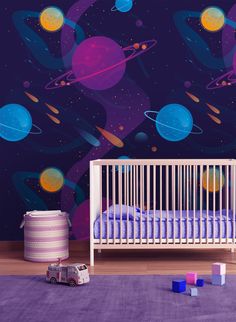 a baby's room with space themed wallpaper and crib in the foreground