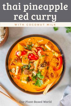 thai red curry in a bowl with chopsticks next to it and the title