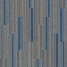 a gray and blue carpet with vertical lines on it's surface, as well as an area for text