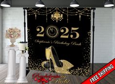 a black and gold new year's eve celebration backdrop with high heeled shoes