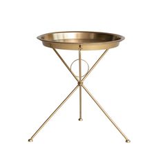 a gold metal tray with two legs and a round bowl on the top, sitting on a white background