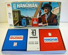 three boxes with different types of items in them on a white surface, one has a sticker that says hangman and the other has an image of a man holding a baseball bat