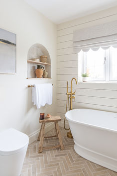 Dijon tumbled metro tiles laid in a herringbone pattern, in a newly renovated bathroom. Brick Tile Floor Bathroom, Glazed Brick Tiles, Cream Tiles, Indoor Tiles, Brick Tile Floor, Limestone Floor Tiles