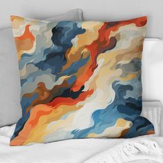 a colorful pillow on a bed with white sheets and pillows in the background is an abstract painting