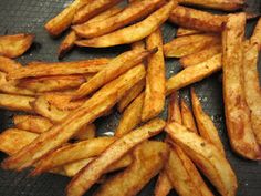 french fries are fried on a grill pan