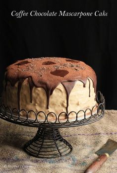 coffee chocolate mascarpone cake on a wire rack