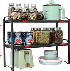 a shelf filled with lots of food next to a coffee pot and cup on top of it