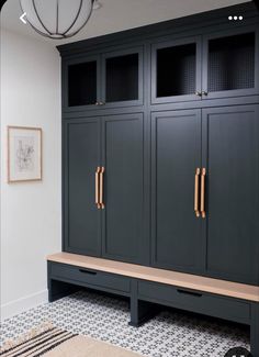 a black cabinet with two doors and some drawers