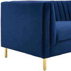 a blue couch with gold legs on a white background