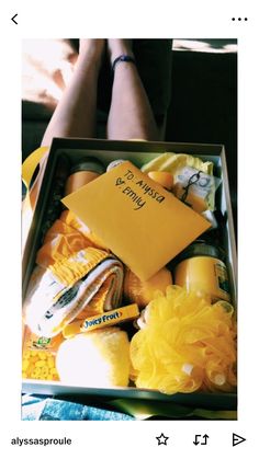 a box filled with lots of yellow items