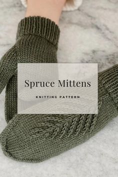 a pair of green knitted mittens sitting on top of a marble floor with the text spruce mittens knitting pattern