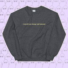 Strange and Unusual crewneck Say it three times and he'll appear. One of our favorite classic Halloween movies had to be made into a sweatshirt, and what better than the iconic quote from our girl Lydia? This crewneck has the perfect oversized fit for a cozy Fall halloween inspired look! What you will get: A soft, lightweight shirt with the right amount of stretch. It's comfortable and best of all: it's unisex. * 100% combed and ring-spun cotton * Shoulder-to-shoulder taping * Side-seam, smartly Classic Halloween Movies, Halloween Sweaters, Quote Sweater, Strange And Unusual, Tim Burton Movie, Halloween Crewneck, Classic Halloween, Movie Quote, Crewneck Design