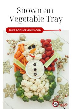 a snowman vegetable tray with broccoli, cauliflower and carrots