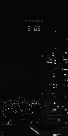 black and white photo of city at night with the words i'm going back to 5 05