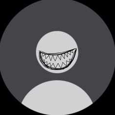 an image of a creepy face in the middle of a black and white circle with teeth