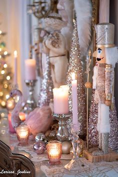 a table topped with lots of candles and decorations