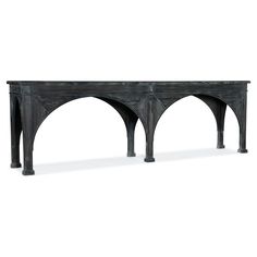 an old wooden table with arches on the top and bottom, against a white background