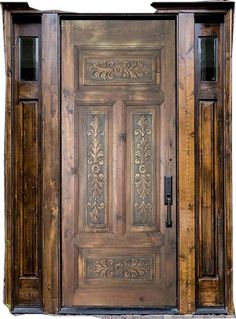 an old wooden door with decorative carvings on it