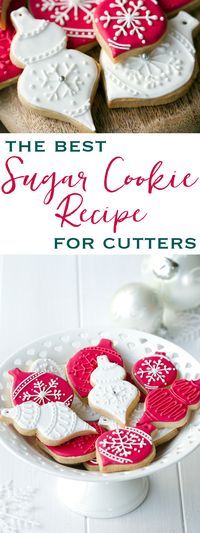 the best sugar cookie recipe for cutters and decorated cookies on a white platter