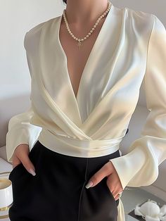 Product Description: This white V-neck long-sleeved elegant shirt perfectly shows the elegance of spring and autumn, suitable for your daily wear. Sleeve length: long sleeve Elasticity: slightly elastic Thickness: regular Neckline: V-neck Activity: daily Pattern: solid color Style: elegant Color: white Size: S, M, L, XL, XXL The shirt adopts a classic white design, which is simple and generous, easy to match with various clothing styles, whether it is matched with trousers or skirts, it can show Woman Shirt Design, White Inspo Outfit, Casual Elegant Outfits, White Shirt Outfit, V Fashion, Elegant Vibes, Skirts Pattern, White Fits, Wide Leg Pant Suit