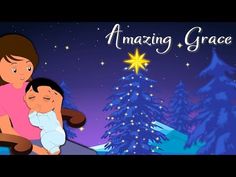 a woman holding a child in front of a christmas tree with the words amazing grace written on it