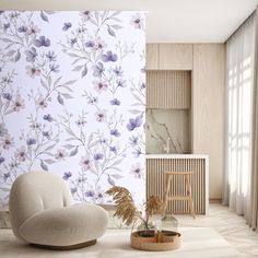 a living room with floral wallpaper and white furniture