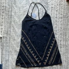 Free People Brand New Black Flowy Dress With Sequins. Would Be So Cute For A Party Or New Year’s. Size Xs. Originally Bought It On Sale For $50, But Never Had A Chance To Wear :( The Gold Free People Label/Tag Was Missing When I Bought It Bohemian Sleeveless Mini Dress For Night Out, Black Mini Dress For Festival, Black Sleeveless Mini Dress For Festival, Chic Black Dress For Festivals, Black V-neck Mini Dress For Festival, Black Mini Dress With V-neck For Festival, Gold Free People Dress, Free People Jewel Mini Dress, Free People Gold Velvet Dress