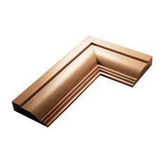 a close up view of the corner of a copper colored cabinet door handle on a white background