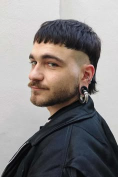 Make a bold statement and elevate your hairstyle with a trendy mullet haircut for men. This timeless hairstyle is perfect for those who want to show off their unique style and stand out from the crowd. Whether you're going for a casual look or dressed up for a special occasion, the mullet haircut is perfect for showcasing your individuality and edgy side. #mullet #mullethaircut #mullethaircutformen #menmullet #mulletformen #menshaircuts #bestmenshaircuts #trendymenshair Men Edgy Haircut, Side Mullet, Trendy Mullet, Mens Mullet, Grunge Haircut