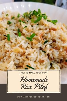 a white plate topped with rice and green onions