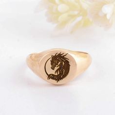 About item Item :- Dragon Engrave signet Ring Ring size :- Chose from variation (Custom size accepted) Material  :- 925 Sterling silver Purity  :- 92.5 Title:-14K Solid Gold Chinese Dragon engrave Signet Ring, 925 Silver Dragon Head Signet Ring, Engraved Chinese Dragon Jewelry,Mythology Dragon Ring, Family ring, Gift for her, Christmas day gift Description:- We use 925 sterling silver to making jewelry. We accept all types of custom & personalized order. Please send us a message if you are interested in a custom creation. Shipping profile:- We ship all order within 3-5 days. But custom order takes time. Customer service :- If you have any question about our products & services, feel free to contact us. We do always best for our customers Other Specification:- Please Visit Our Shop home pag Gold Chinese Dragon, Family Ring, Family Rings, Dragon Ring, Dragon Jewelry, Dragon Head, Silver Dragon, Chinese Dragon, Signet Ring