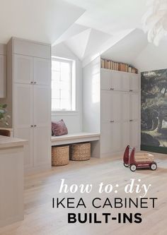 an image of a room with white cabinets and wood floors that says how to diy ikea cabinet built - ins