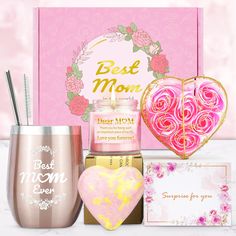 the mother's day gift set includes a heart shaped cup, candle and greeting card