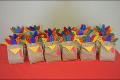 paper bags with turkeys in them on a table